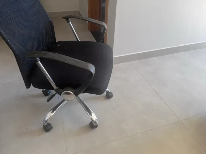 Cadeira estofada para estudos