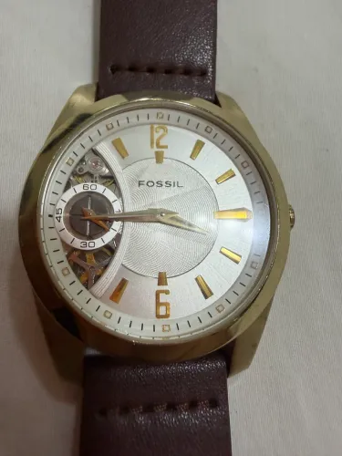Relógio fóssil Twist automático e quartz