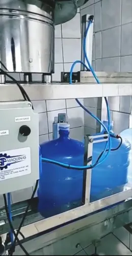 Tampador automático