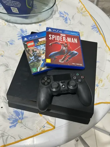 Ps4 850 $ usado em bom estado pronto pra jogar com 2 jogos
