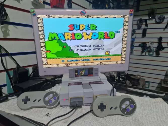 Super Nintendo + fita Mario World + 2 controles cel 19- * whats