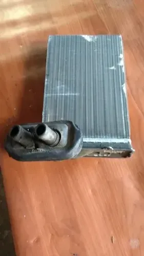 Radiador ar forçado/condicionado Chery Celer.