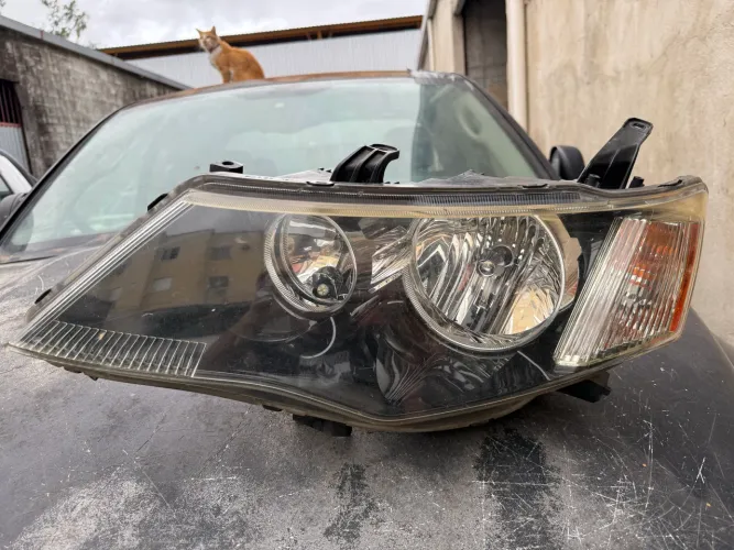 Farol esquerdo Outlander 07 08 09 2010
