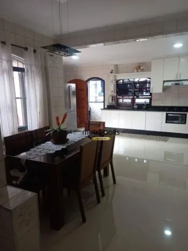 Sobrado com 4 dormitórios para alugar, 353 m² por R$ 5.196,92/mês - Vila Curuçá - Santo An