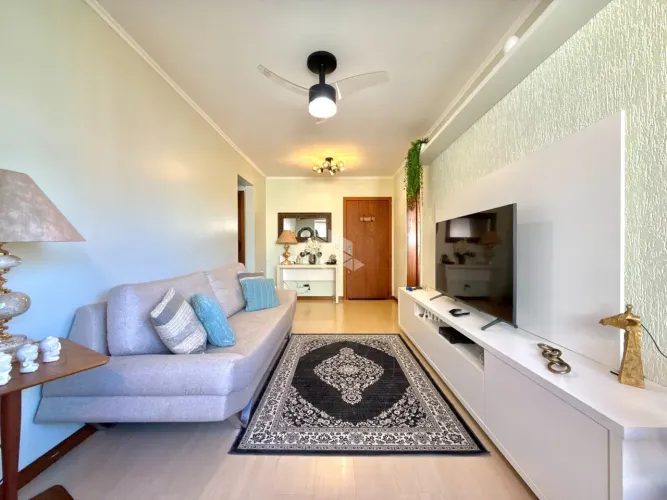 APARTAMENTO SEMIMOBILIADO DOIS DORMITÓRIOS VAGA DE GARAGEM ESCRITURADA