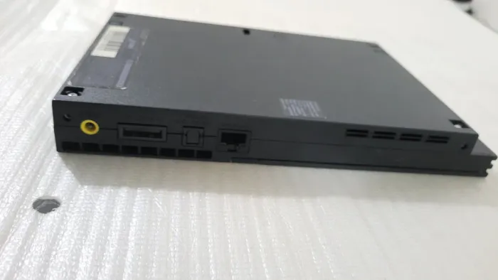 Ps2 Slim 70000 lacrado (pra conserto) ficou guardado muito tempo, liga mas não dá video 