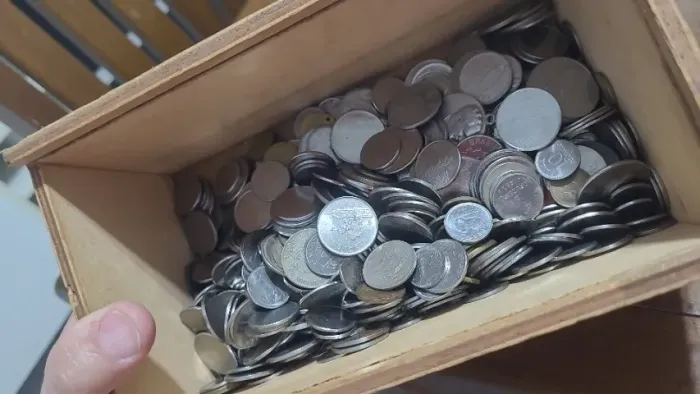 Moedas para colecionador e células de dinheiro