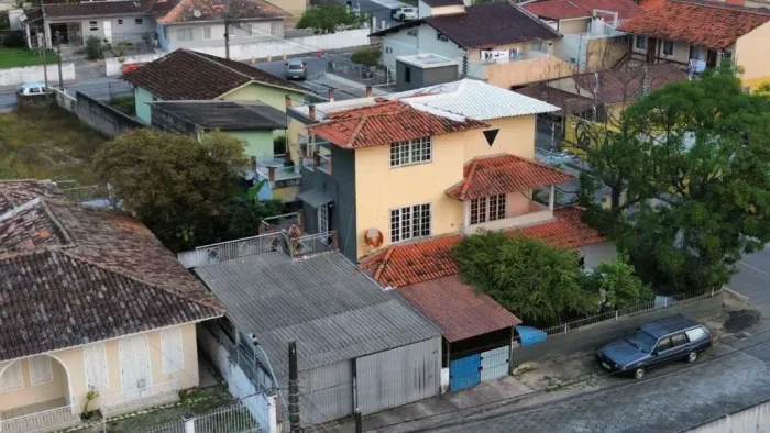 Casa com 5 dormitórios à venda, 412 m² por R$ 1.450.000,00 - Centro - Palhoça/SC