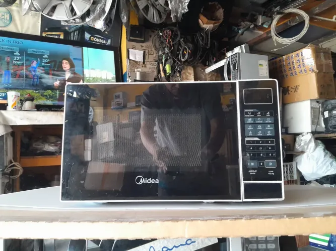 Micro-ondas midea usado com garantia 