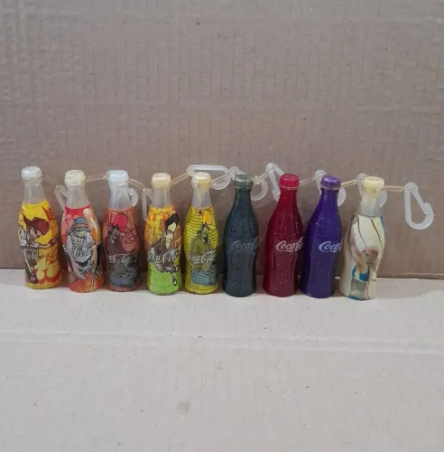 Lote 9 garrafinhas Coca Cola