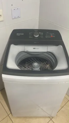 Máquina de lavar toda boa
