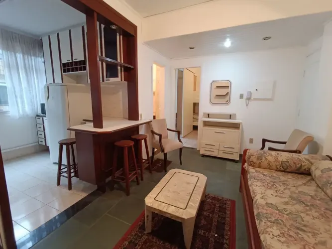 Gonzaga praia, otimo, quarto e sala mobiliado, andar alto, cozinha, wc social, garagem com