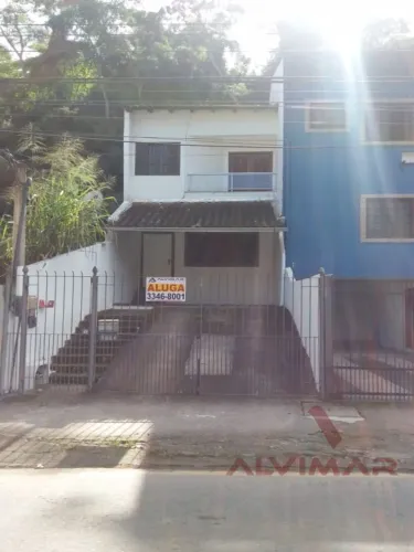 Casa com 3 dormitórios para alugar, 110 m² por R$ 1.820,00 - Vila Santa Cecília - Volta Re