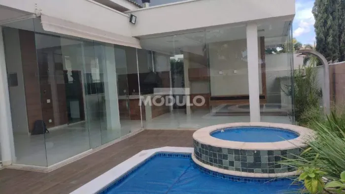 Casa residencial em condomínio para locação, bairro Jardim das Palmeiras