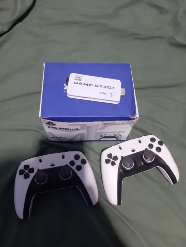 Mini game retro 2.4G wireless vai com dois controles tem jogos Nintendo etc...