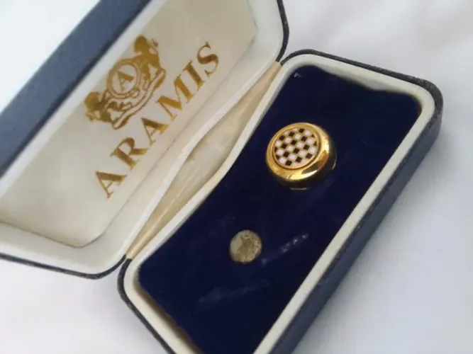 1 prendedor de Gravata ( Aramis)