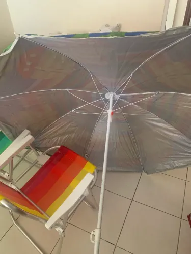 Vende -se guarda sol / proteção contra raio ultra violeta .