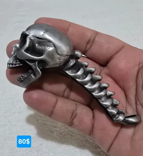 Abridor de garrafas caveira em aço 