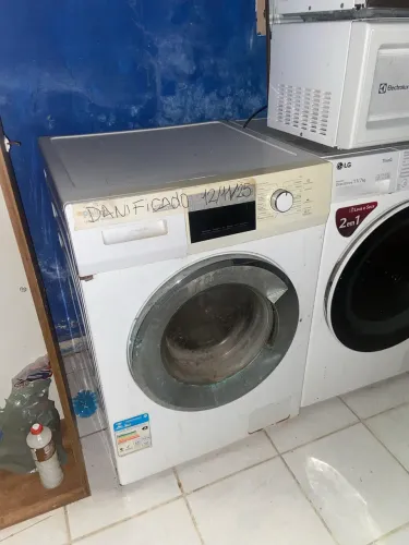 Máquina de lavar com defeito