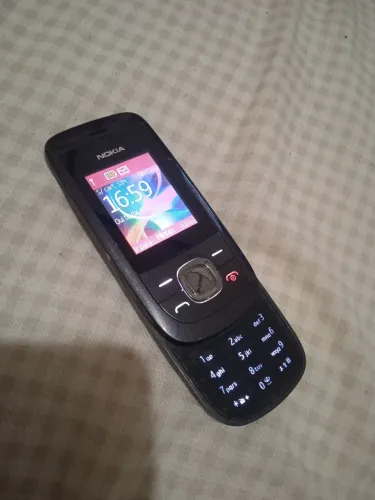 Tel Cel Nokia antigo funcionando perfeitamente com carregador