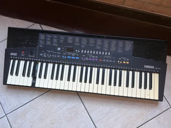 Teclado psr 210