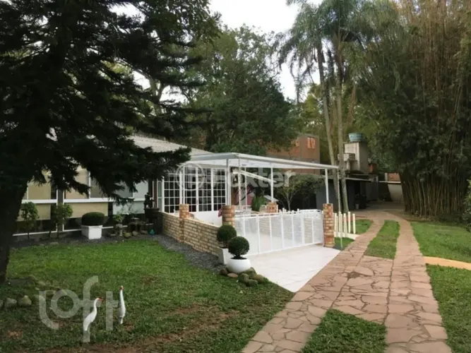 Casa à venda Estrada Joaquim Teixeira de Souza, Parque Itacolomi - Gravataí