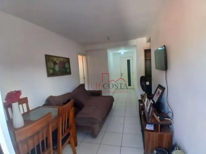 Apartamento com varanda, sala, 2 dormitórios sendo 1 suíte. 1 vaga de garagem à venda, 60 