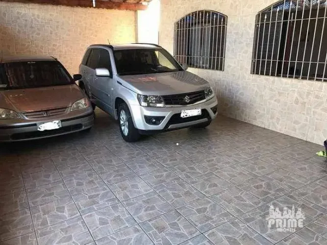 Casa com 2 dormitórios à venda, 240 m² por R$ 650.000,00 - Maracanã - Praia Grande/SP