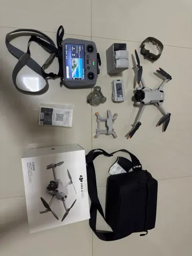 Drone DJI mini 4 pro com kit full 3 baterias carregador  controle rc2 e acessórios 