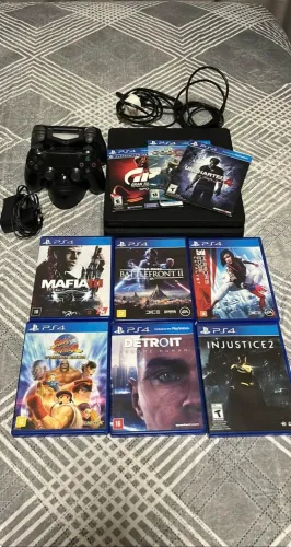 PlayStation 4 1tb com 9 jogos e base de carregamento