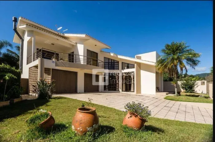 Casa com 5 dormitórios à venda, 323 m² por R$ 3.400.000,00 - Itacorubi - Florianópolis/SC