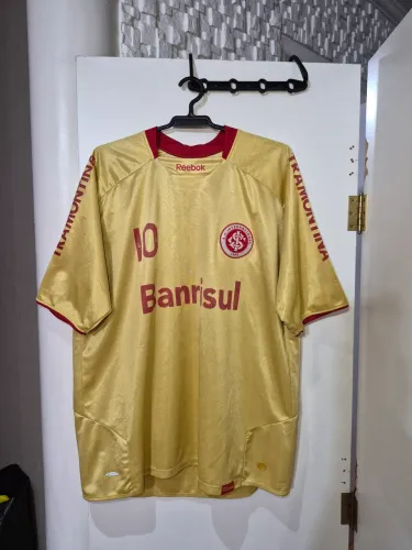 Camisa Internacional dourada centenário Rebook 2009