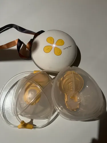 Bomba elétrica tirar leite mãos livres Medela
