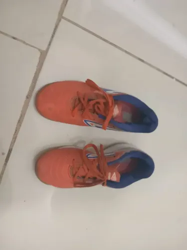 Chuteira Umbro Laranja