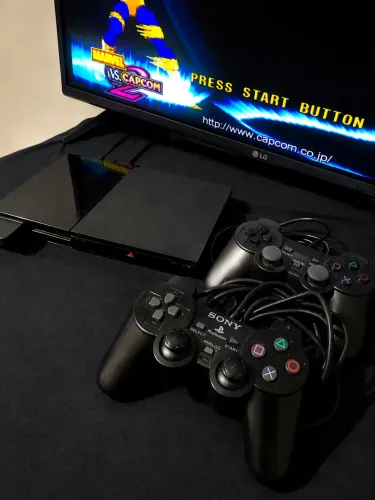 Play Station 2 Slim + 2 Controles + 11 Jogos Mídia Física