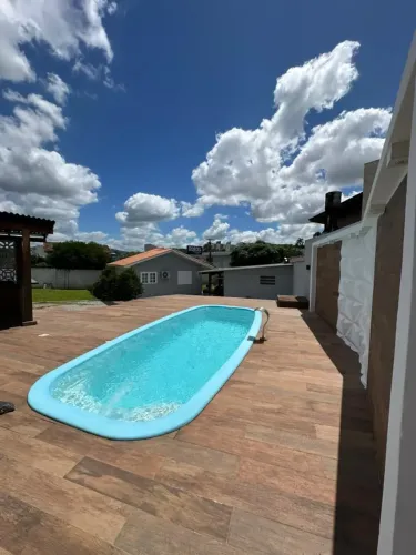 Casa de alvenaria com amplo terreno e piscina no bairro São Luiz a 2min do Centro de Crici