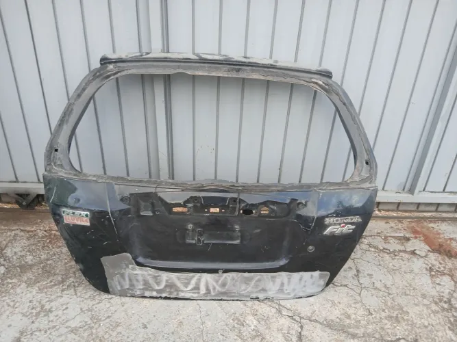 Tampa traseira Honda fit 2004/08