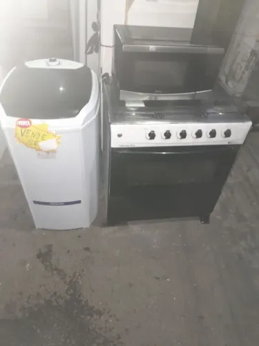 Vende um fogão 4bocas foncionando branco e um micro-ondas um taiquinho suggar 10kls