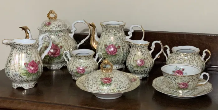 Conjunto de chá com 14 peças em porcelana Real