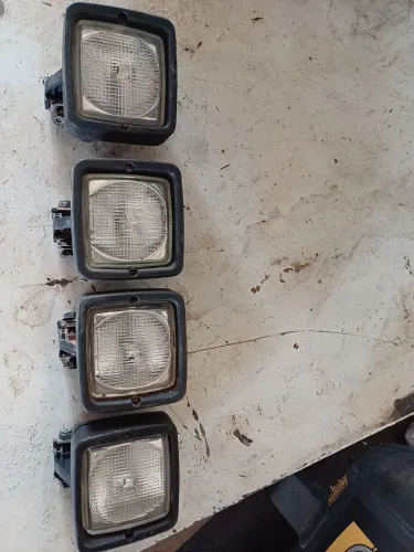 Faróis original caterpillar 