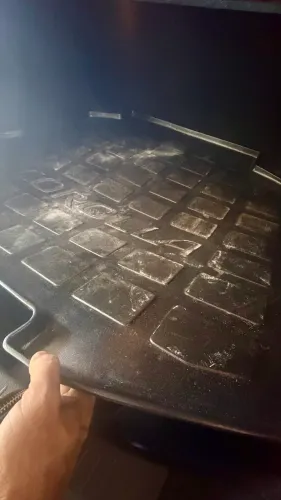 Bandeja proteção porta mala Corolla 2023