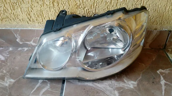 Farol esquerdo Volkswagen golf 2008