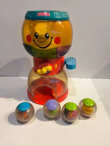 Brinquedo Fisher-Price Roll-a-Rounds em formato de baleiro USADO -RARO