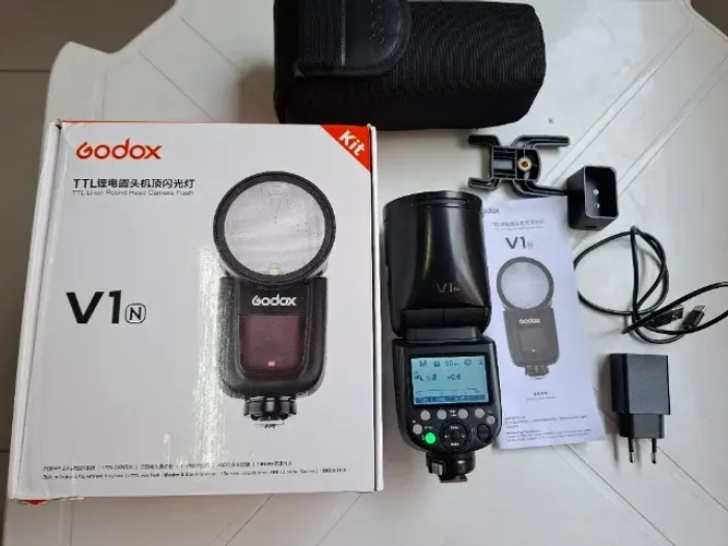 Flash Godox V1-N Bateria Cab Redonda TTL Master Perf Gar Loja até 12x SP CPS SJC
