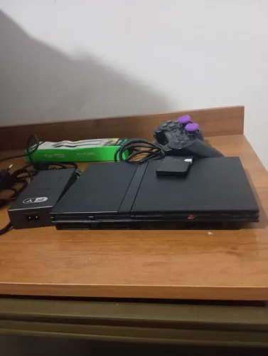 PS2 funcionando perfeitamente mas cabos e 1 controle original+ memoricard 