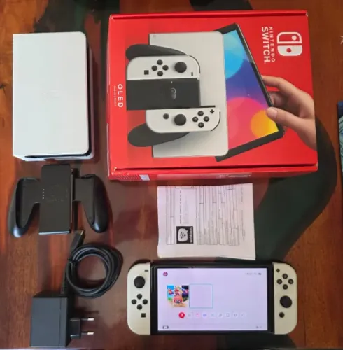 Nitendo Switch oled branco semi novo mais maleta e cartao 64gigas 