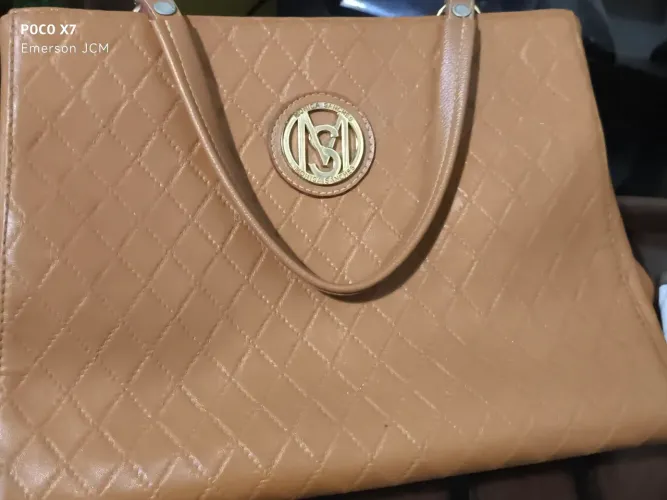 Bolsa Mônica Sanches original(a Ex deitou o cabelo mais a bolsa ficou)- excelente estado.