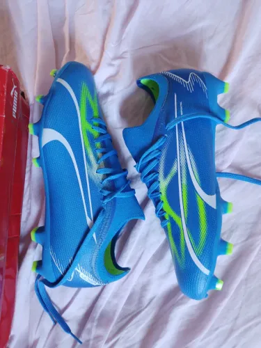 Chuteira Puma Ultra Match FG/AG
