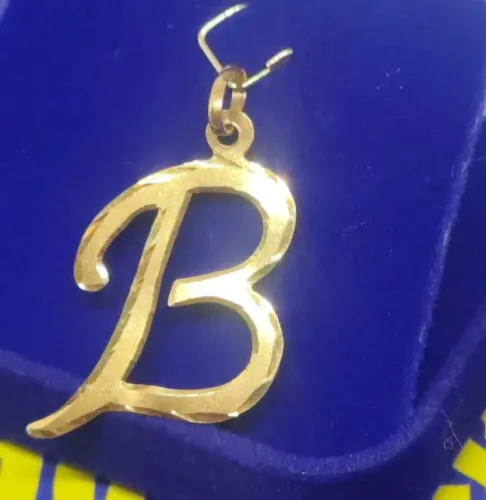 Pingente letra B Ouro 18 Kilates Peso 1.02 Gramas 2 mm Temos todas as Letras