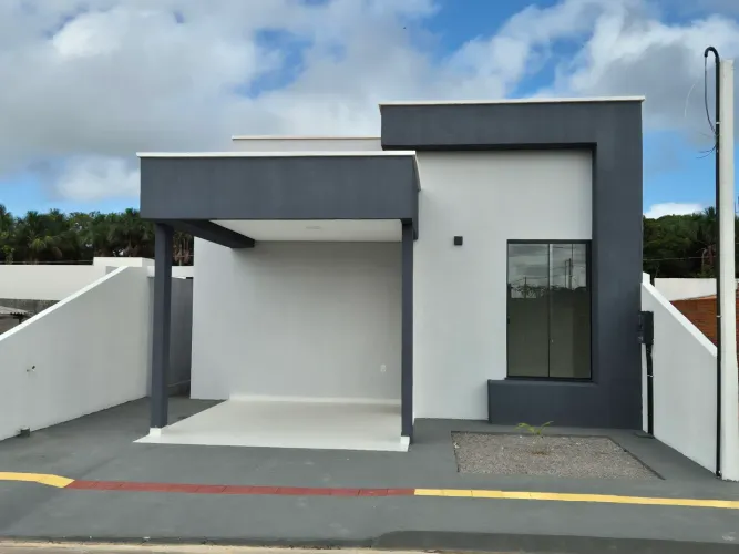 Casa modelo em condomínio( lote+construção)